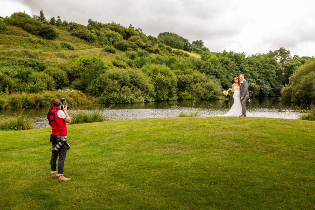 Female Photographer Taking photos at a wedding